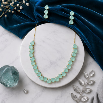 Antique Gold Plated Large CZ, Crystal & AD Studded Single Line Uneven Necklace Set with Earrings for Women - Green/Mint Green (SJN_362_G)